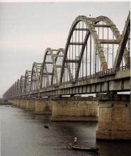 THE THIRD RAIL BRIDGE ON THE GODAVARI AT RAJAMUNDHRY WITH BOWSTRING ARCHES